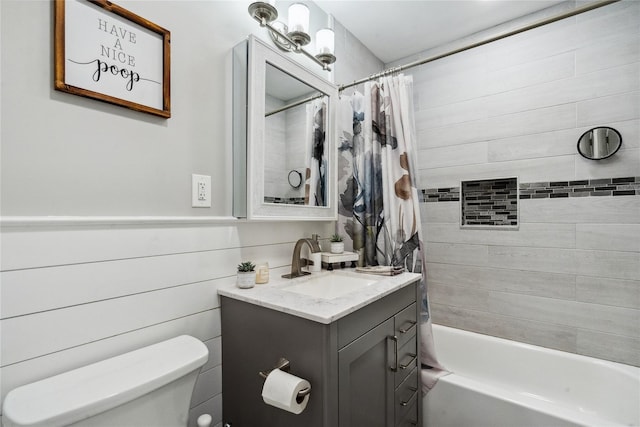 full bathroom featuring vanity, toilet, and shower / bathtub combination with curtain