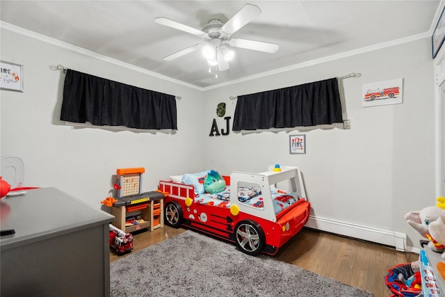 bedroom featuring hardwood / wood-style floors, a baseboard radiator, ceiling fan, and ornamental molding