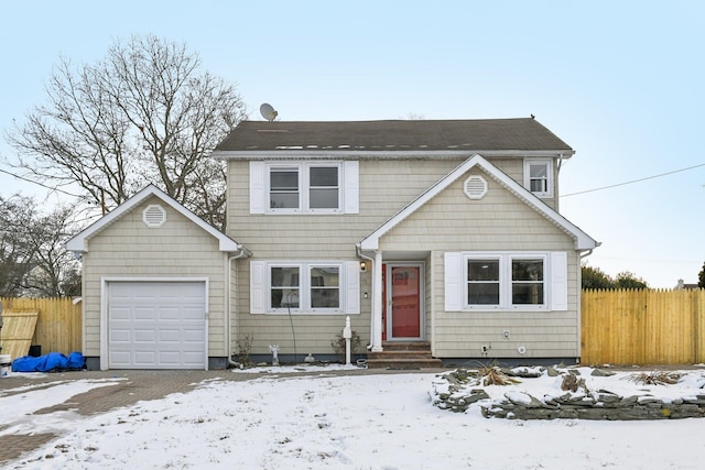 view of front of home with a garage