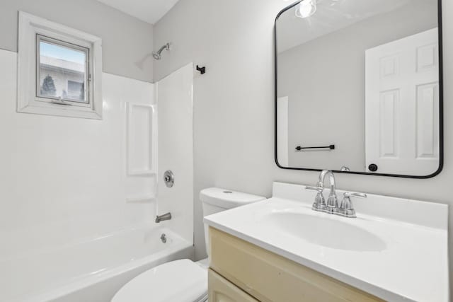 full bathroom featuring vanity, shower / tub combination, and toilet