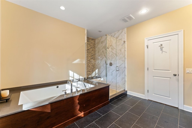 bathroom featuring separate shower and tub and tile patterned flooring