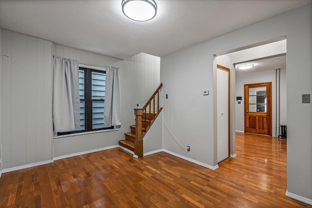 spare room featuring hardwood / wood-style floors