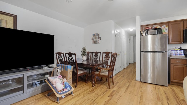 2413 Wilson Ave, Bronx, NY 10469 - dining area featuring light hardwood / wood-style floors