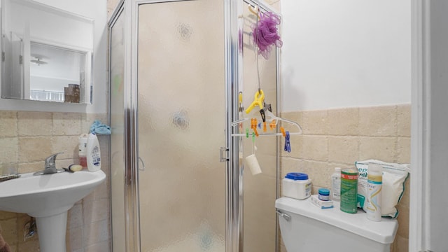 2413 Wilson Ave, Bronx, NY 10469 - bathroom with an enclosed shower and toilet