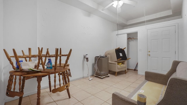 2413 Wilson Ave, Bronx, NY 10469 - interior space featuring ceiling fan, light tile patterned floors, and a tray ceiling