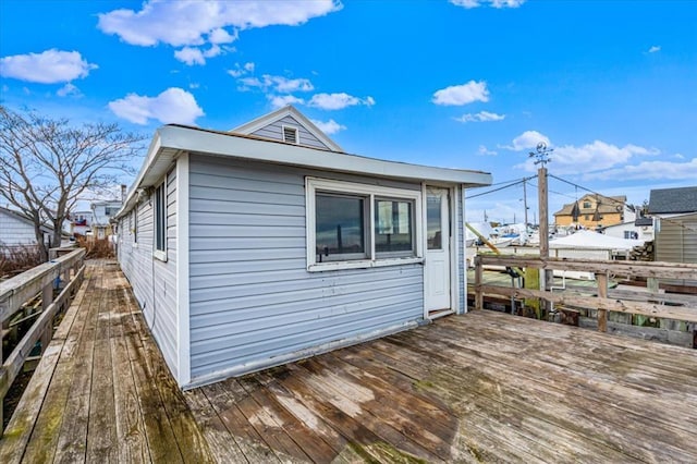 view of side of home featuring a deck