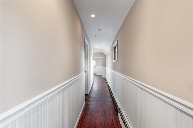 corridor with dark hardwood / wood-style floors