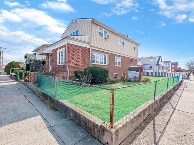 view of home's exterior featuring a yard