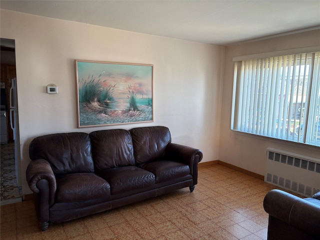 living room featuring radiator