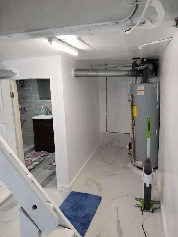 basement with gas water heater