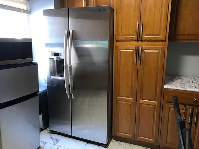 kitchen with appliances with stainless steel finishes