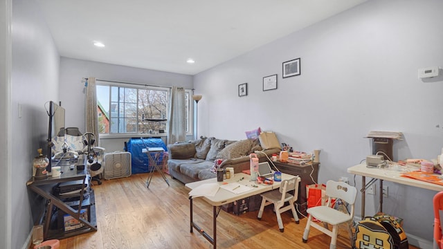 living room with light hardwood / wood-style floors