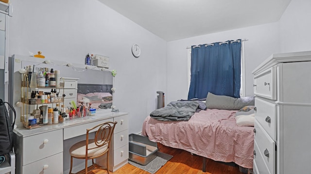 bedroom with light wood-type flooring