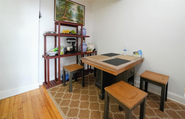 office space with hardwood / wood-style flooring