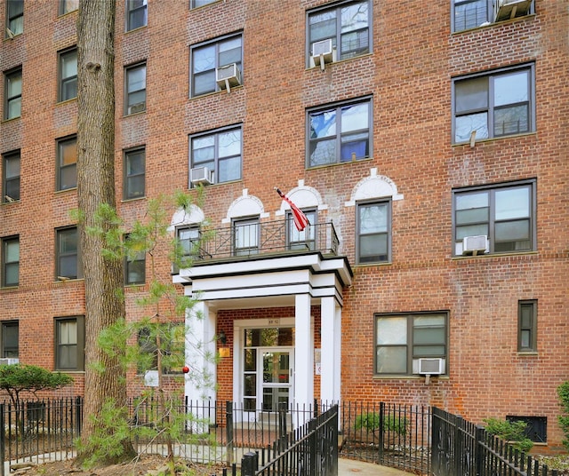 view of building exterior featuring cooling unit