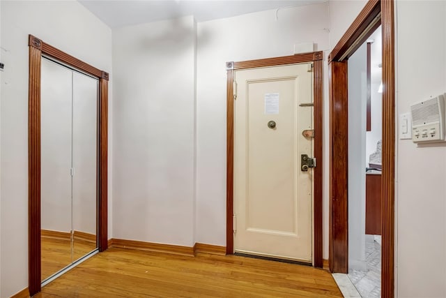 corridor featuring light hardwood / wood-style flooring