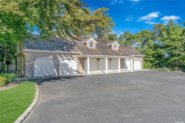 garage featuring covered porch