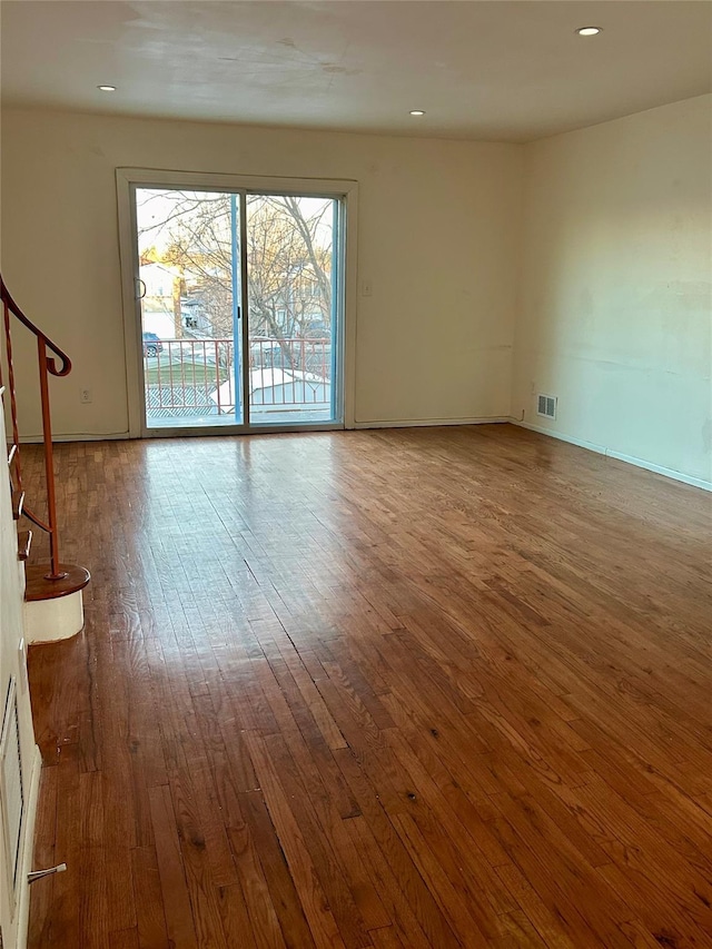 empty room featuring hardwood / wood-style floors