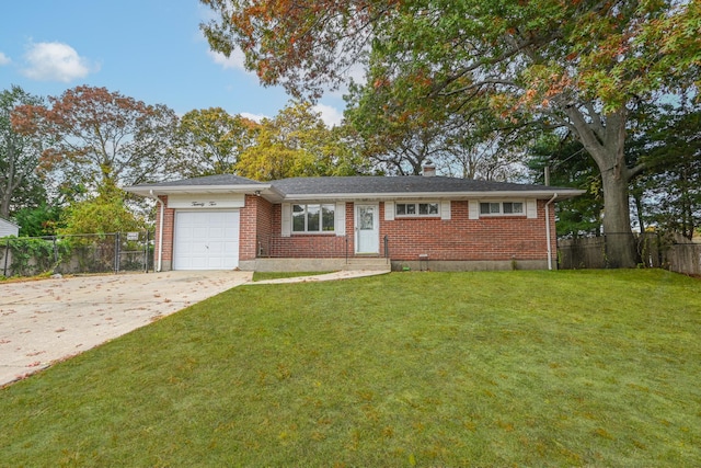 ranch-style home with a garage and a front lawn