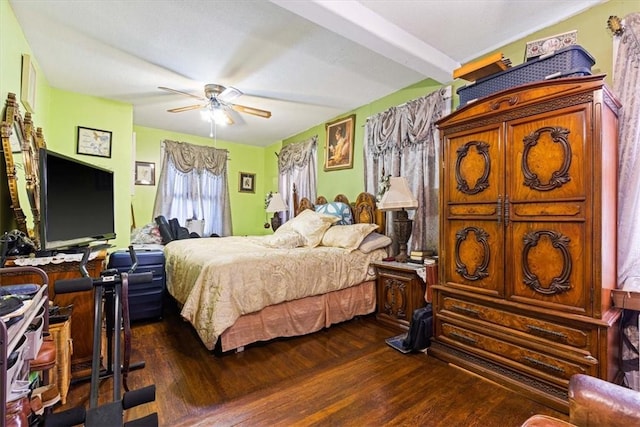 bedroom with ceiling fan and dark wood-type flooring