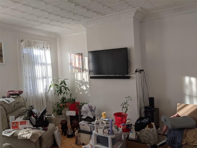 living room featuring parquet flooring and ornamental molding