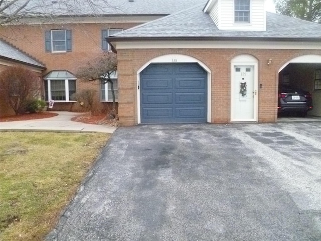 view of front of property featuring a garage