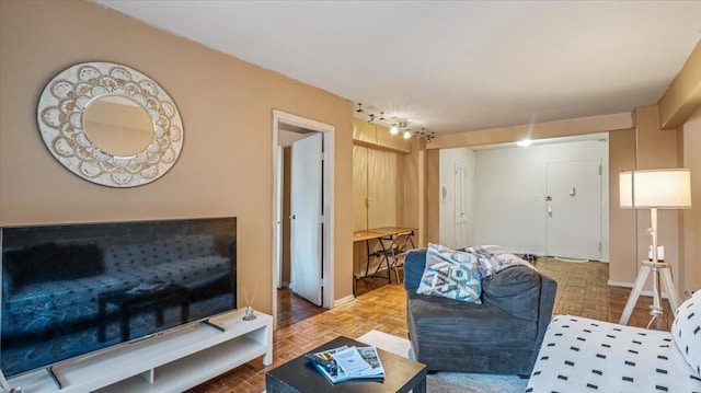 living room featuring parquet floors