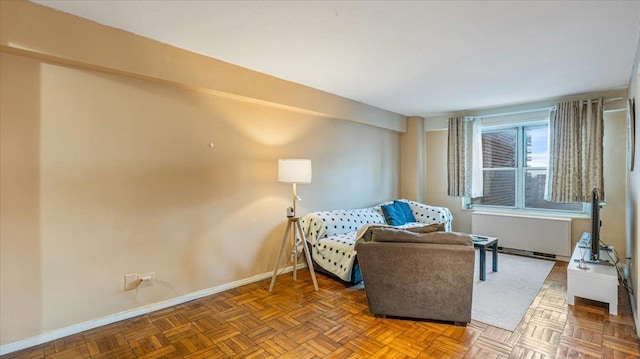 sitting room with parquet flooring