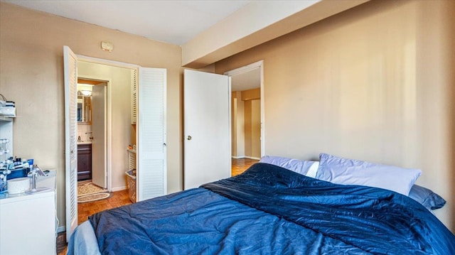 bedroom with wood-type flooring