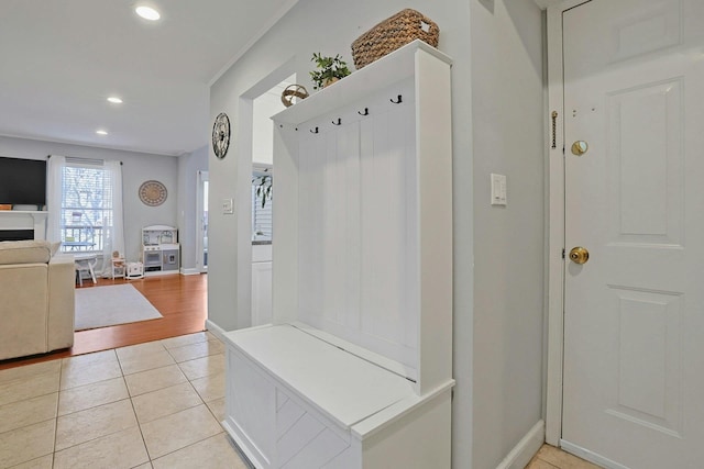 mudroom with light tile patterned floors