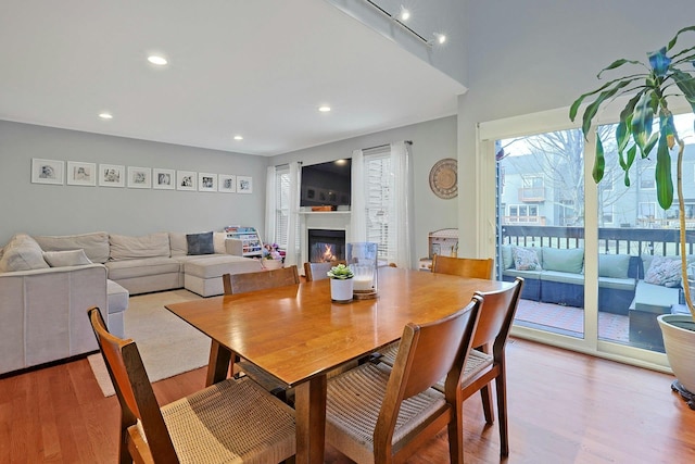 dining area featuring light wood-type flooring