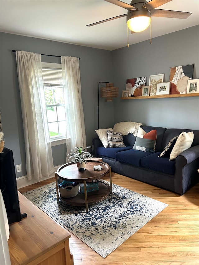 living room with light hardwood / wood-style flooring