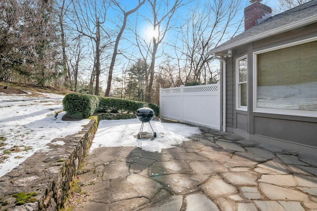 view of snow covered patio