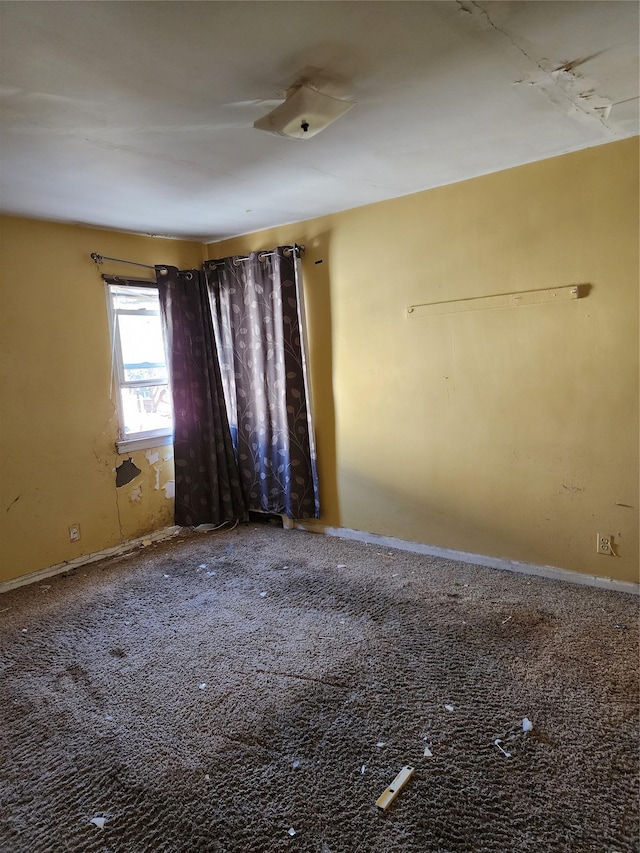 unfurnished room with carpet floors