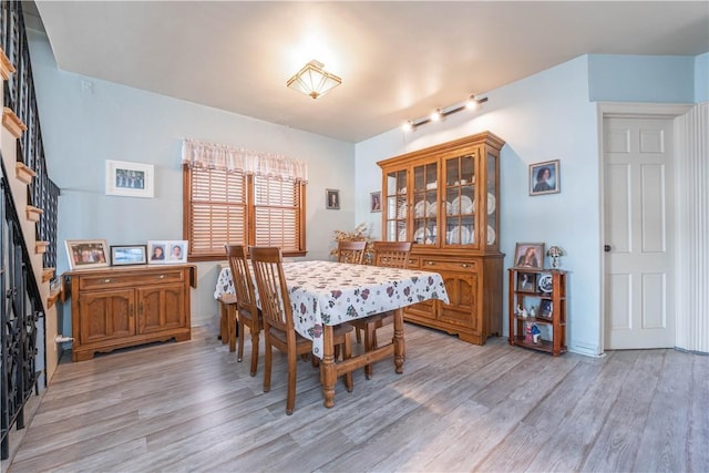 dining room with light wood-type flooring