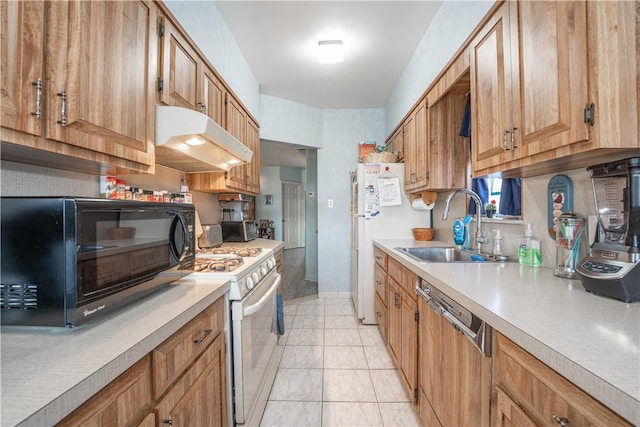 kitchen with white appliances and sink