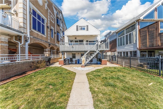 exterior space featuring a yard, a patio, and a deck