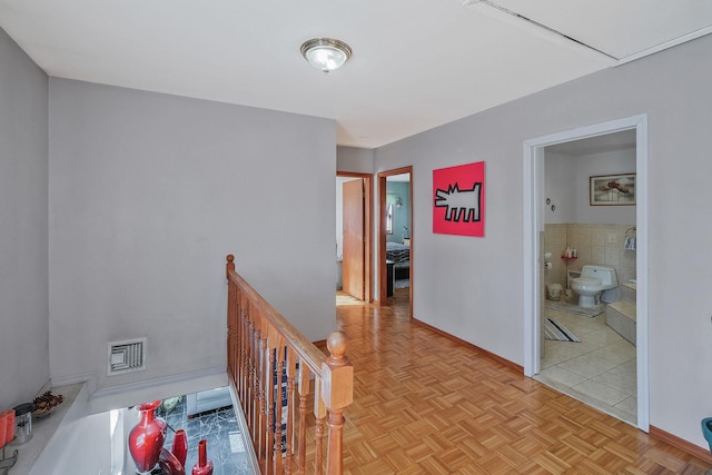 hallway with light parquet floors