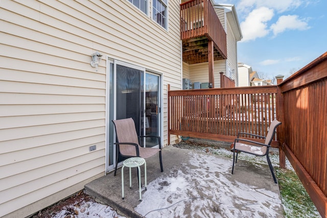 view of snow covered patio