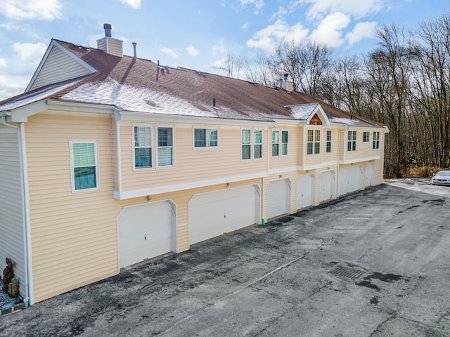 view of home's exterior featuring a garage