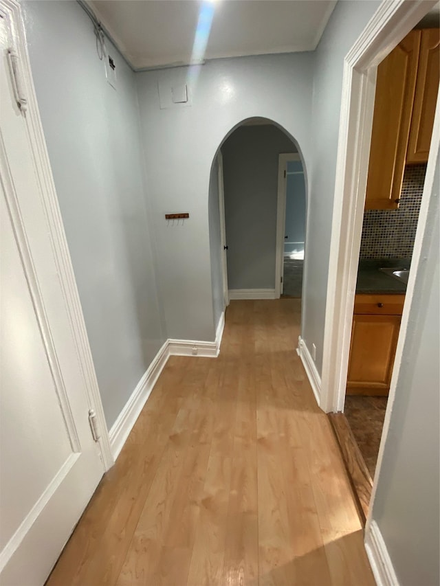 hallway featuring light hardwood / wood-style flooring