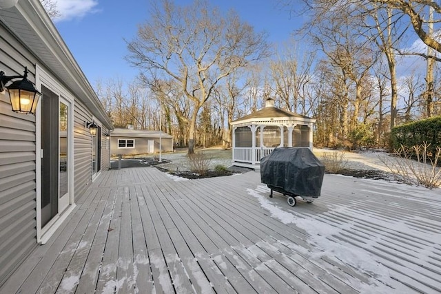 deck featuring a gazebo and a grill