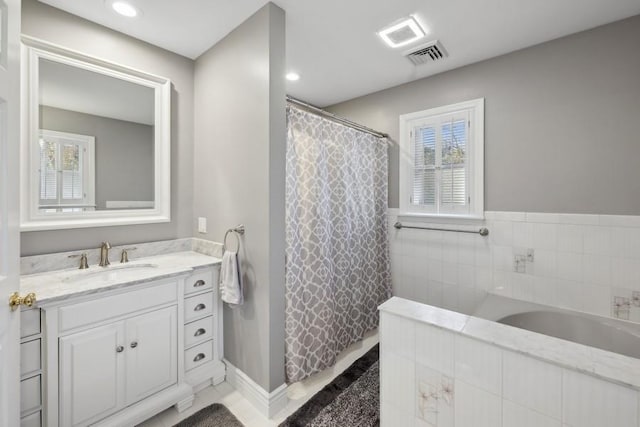 bathroom featuring recessed lighting, visible vents, a bath, curtained shower, and vanity
