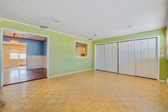 interior space with light parquet flooring