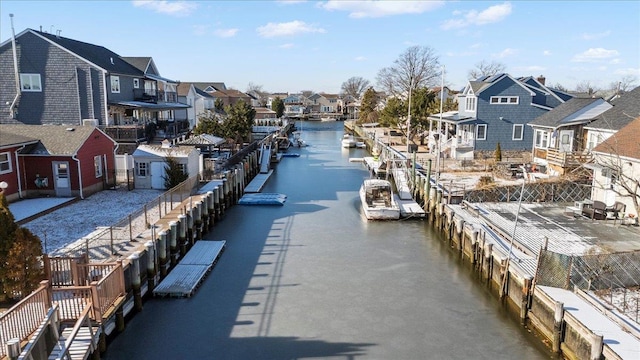 exterior space with a water view