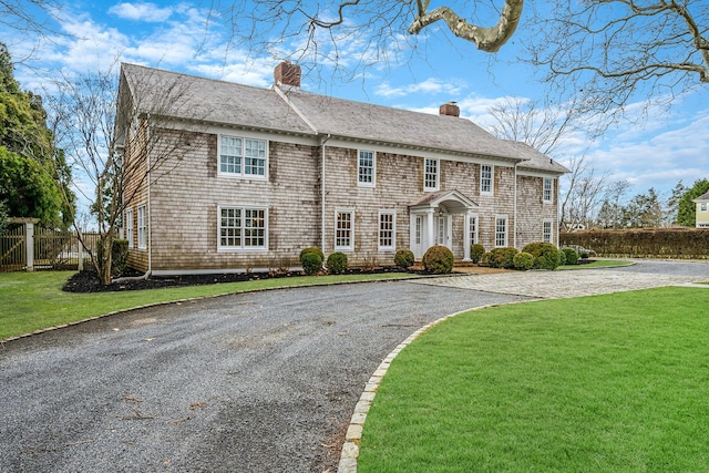 colonial house with a front lawn