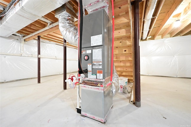 basement featuring heating unit