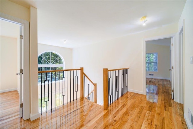 corridor featuring light hardwood / wood-style floors