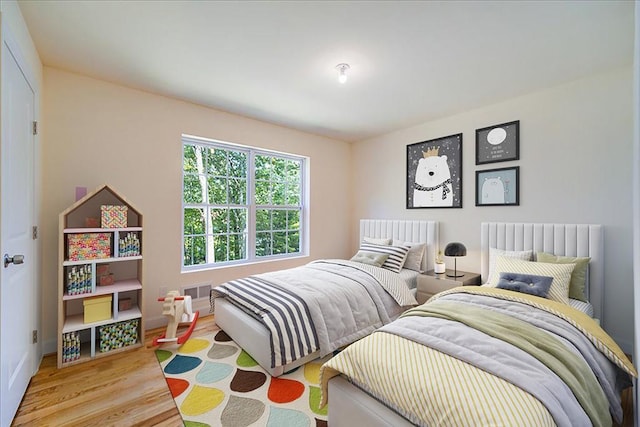 bedroom featuring light hardwood / wood-style floors