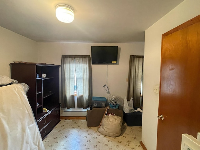 bedroom with a baseboard radiator